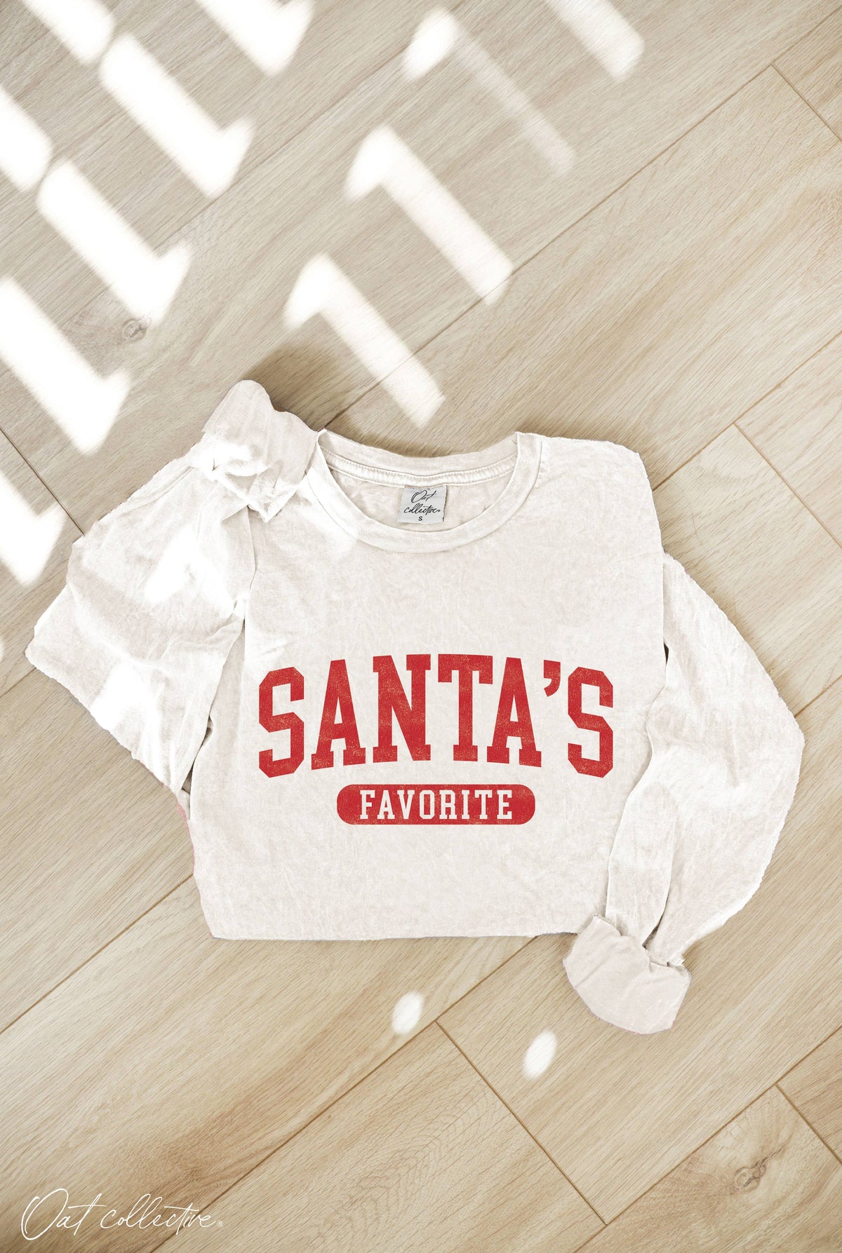 SANTA'S FAVORITE Mineral Washed Long Sleeve Graphic Top